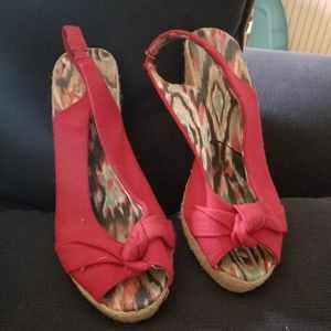 Red peep toe wedges